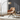 MILOU rotating armchair brick, anthracite metal legs - Castle Line - Design-Master